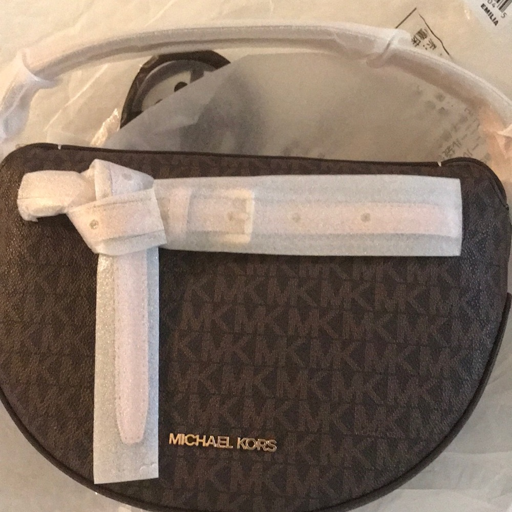 Michael Kors shoulder/cross body leather monogram bad in brown and soft pink.